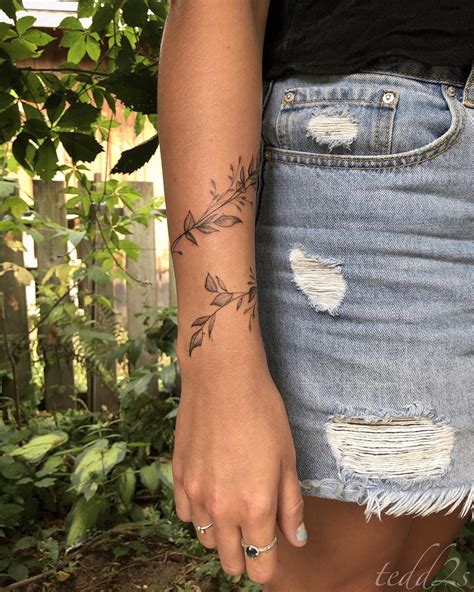 Leaves wrapping around the arm. . Wrap around arm tattoos